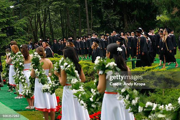 Students attend the Vassar College 2010 commencement at Vassar College on May 23, 2010 in Poughkeepsie, New York.