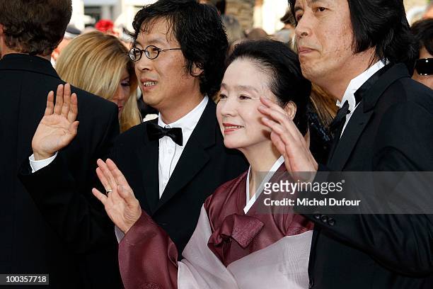 Jun-dong Lee and Jeong-hee Yoon and Lee Changdong attend the Palme d'Or Award Closing Ceremony held at the Palais des Festivals during the 63rd...