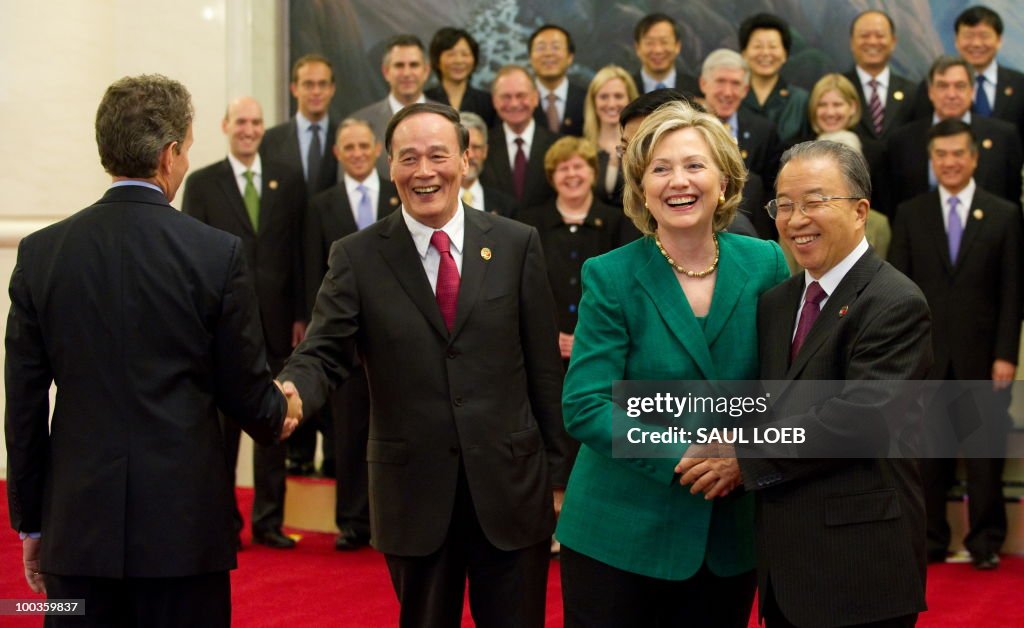 Chinese Vice-Premier Wang Qishan (2nd L)