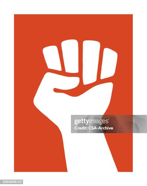 clenched fist raised - raised fist stock illustrations