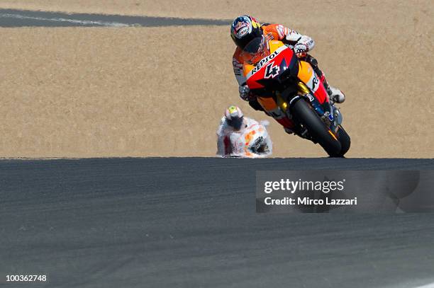 Andrea Dovizioso of Italy and Repsol Honda Team heads down a straight during the first free practice of the MotoGP French Grand Prix in Le Mans...