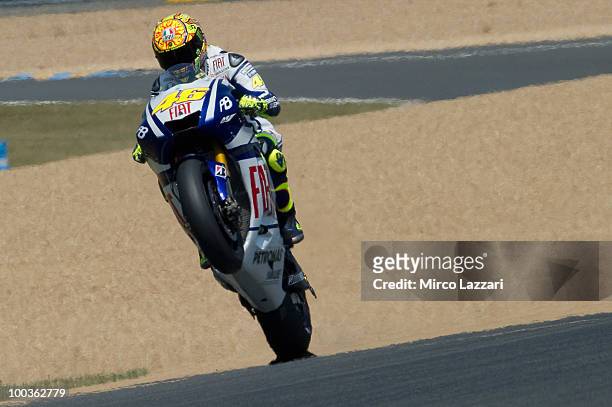 Valentino Rossi of Italy and Fiat Yamaha Team lifts the front wheel during the first free practice of the MotoGP French Grand Prix in Le Mans Circuit...