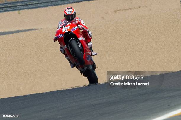 Nicky Hayden of USA and Ducati Marlboro Team lifts the front wheel during the first free practice of the MotoGP French Grand Prix in Le Mans Circuit...