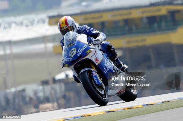 Alex Debon of Spain and Aeroport de Castillo - AJO heads down a straight during the first free practice of the MotoGP French Grand Prix in Le Mans...