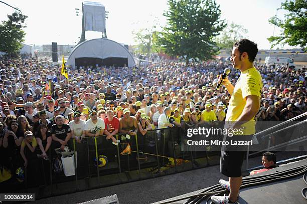 Hector Barbera of Spain and Team Aspar speaks in front of the fans during the event "Riders attend pubblic interviews on stage in front of fans"...