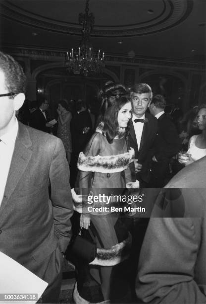 Gloria Steinem, wearing 'Lady MacBeth' gown designed by Luis Estevez, arriving at Shakespeare Ball with Herb Sargent.