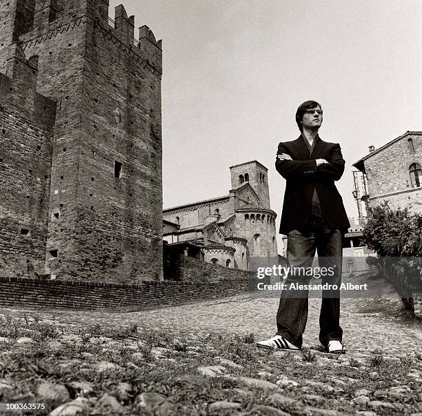 Carlo Brandelli the design director of the english brand Kilgour, the menswear, poses for a portraits session on August 12, 2006 in Castell'Arquato,...