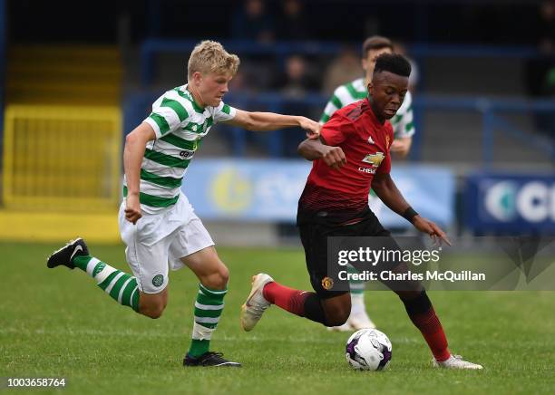 Ethan Laird of Manchester United and Scott Robertson of Celtic during the U19 NI Super Cup gala match between Manchester United and Celtic at...