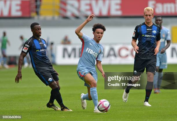 Christopher Antwi-Adjej of Paderborn, Sofiane Diop of Monaco and Julius Dueker of Paderborn battle for the ball during the Friendly match between SC...