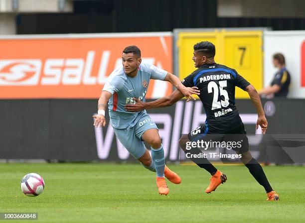 Marcos Paulo Mesquita Lopes of Monaco and Mohamed Draeger of Paderborn battle for the ball during the Friendly match between SC Paderborn 07 and AS...