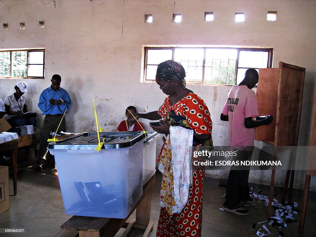 A woman casts her ballot on May 24, 2010