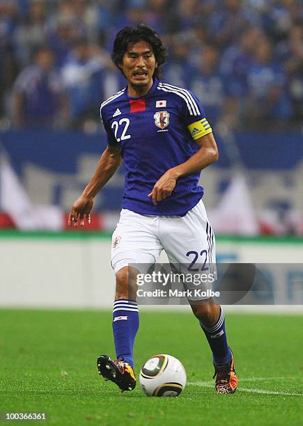 Yuji Nakazawa of Japan passes during the international friendly match between Japan and South Korea at Saitama Stadium on May 24, 2010 in Saitama,...