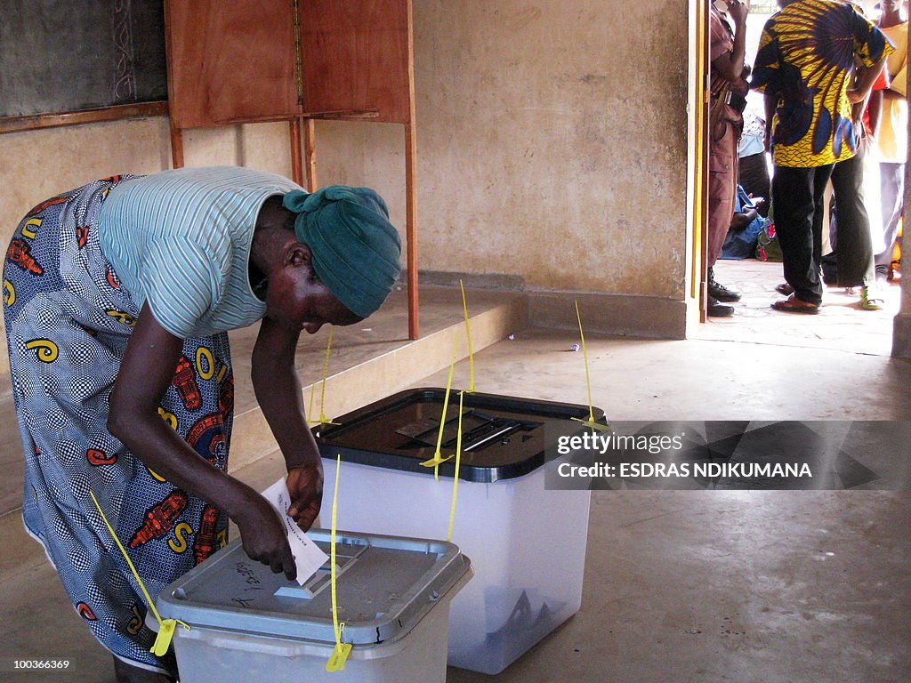 A woman casts her ballot on May 24, 2010