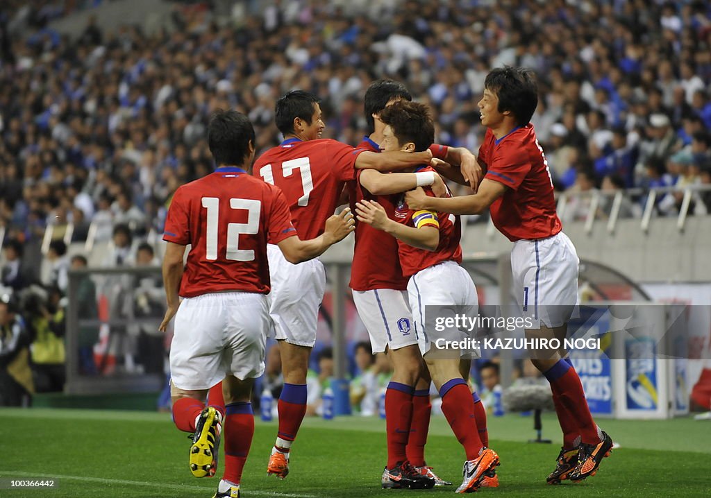 South Korean players celebrate their fir