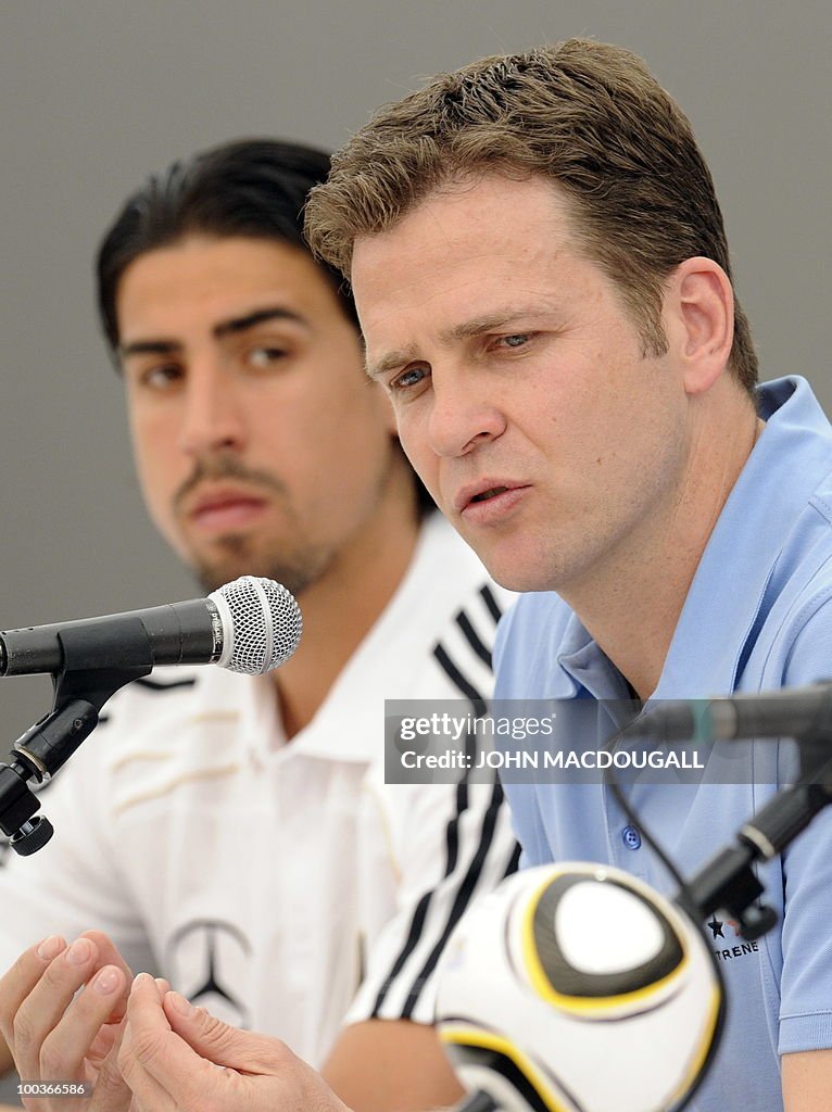 Germany's midfielder Sami Khedira (L) an