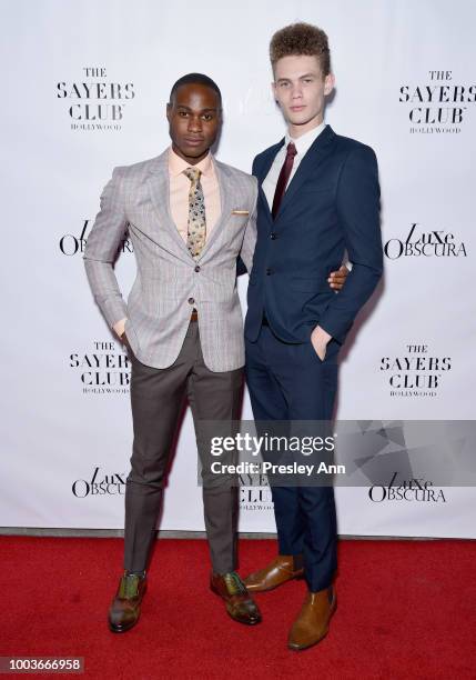 Uche Uba and Malik McBride attend Private VIP Premier of Luxe Obscura at The Sayers Club on July 21, 2018 in Hollywood, California.