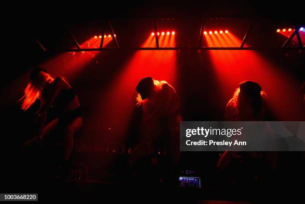 Dancers perform onstage during Private VIP Premier of Luxe Obscura at The Sayers Club on July 21, 2018 in Hollywood, California.