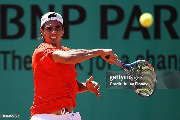 Nicolas Lapentti of Ecuador plays a forehand during the men's singles first round match between Taylor Dent of the United States and Nicolas Lapentti...