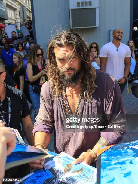 Jason Momoa is seen attending DC Entertainment's Warner Bros. Pictures 'Aquaman' Autograph Signing during Comic-Con International 2018 at San Diego...