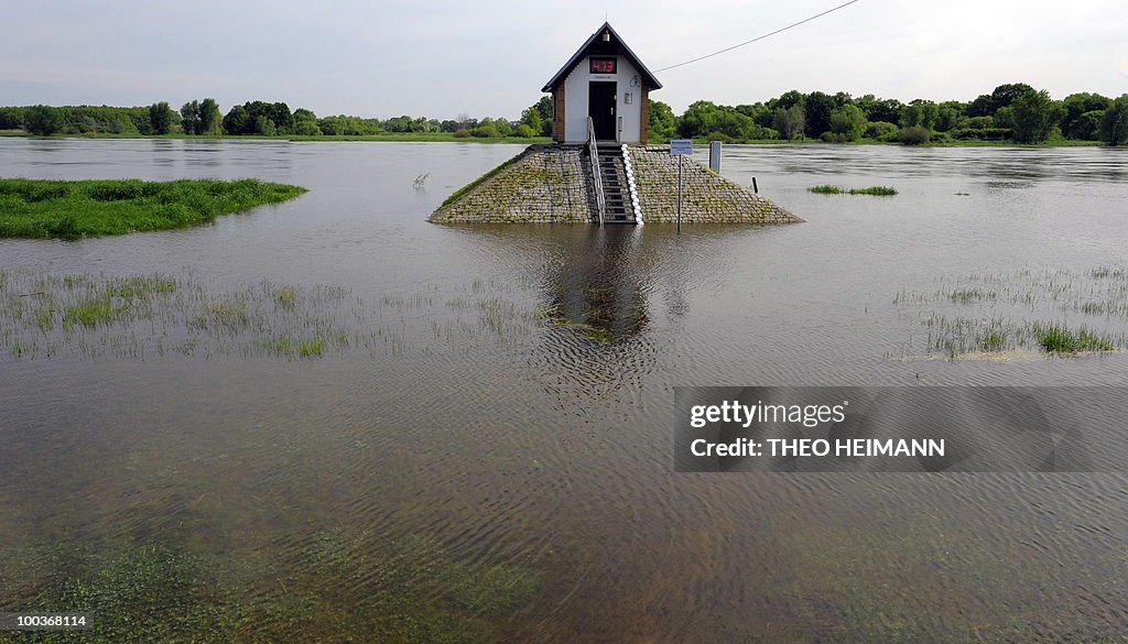 Floods surround a water-level control po