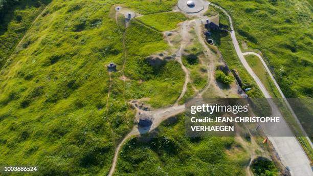 An aerial view shows the World War One war site of Fort de Douaumont in Douaumont, eastern France, on July 16, 2018. - Fort Douaumont was the largest...