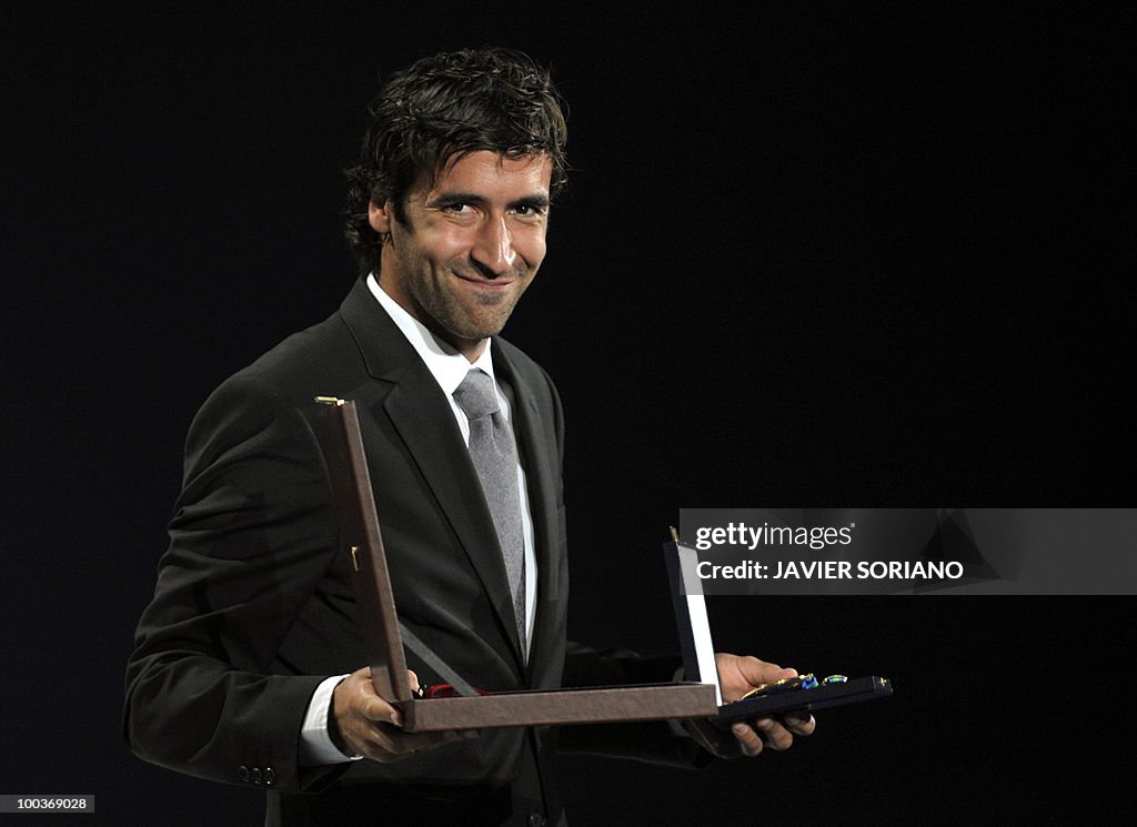 Spain's forward Raul Gonzalez holds his