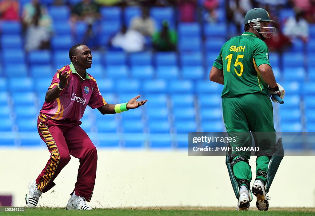 West Indies cricketer Dwayne Bravo react