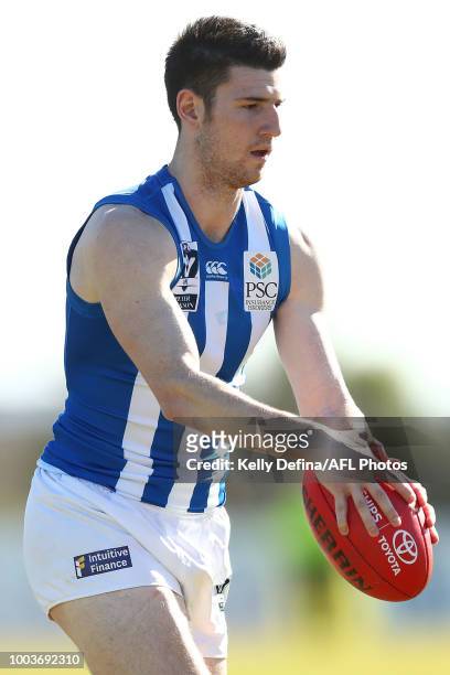 Tyrone Leonardis of North Melbourne kicks the ball during the round 16 VFL match between Frankston and North Melbourne at SkyBus Stadium on July 22,...