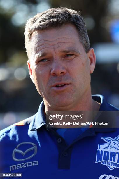 Coaching team of North Melbourne speak to players during the round 16 VFL match between Frankston and North Melbourne at SkyBus Stadium on July 22,...