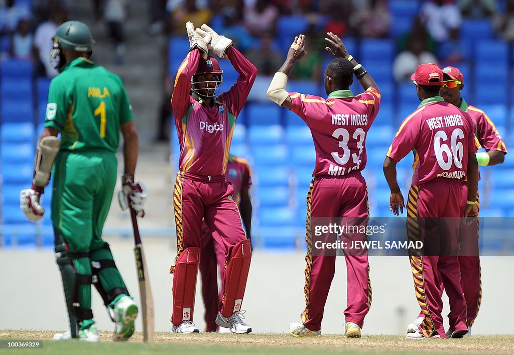 West Indies cricketer Nikita Miller (C)