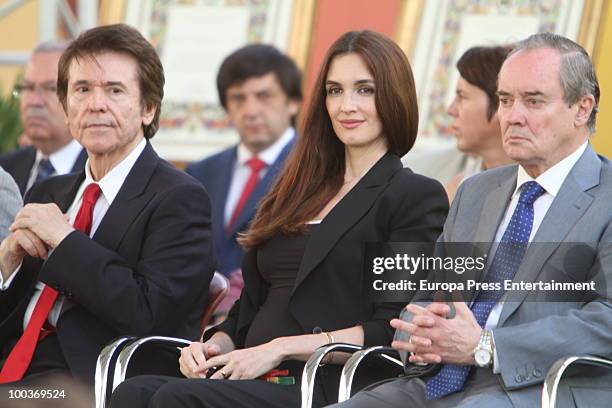 Raphael, Paz Vega and Jose Antonio Maldonado attend the Seville Golden Medal Ceremony at Seville Province Day on May 23, 2010 in Seville, Spain.