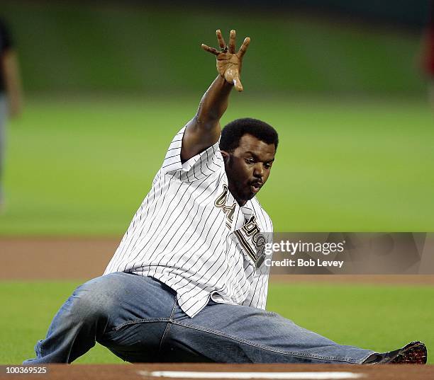 Comic and actor Craig Robinson throws out the first pitch before the Tampa Bay Rays play the Houston Astros at Minute Maid Park on May 23, 2010 in...