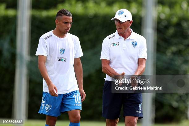 Ismael Bennacer and Aurelio Andreazzoli manager of Empoli FC in action during the Pre-Season Friendly match between Pro Vercelli and Empoli FC on...