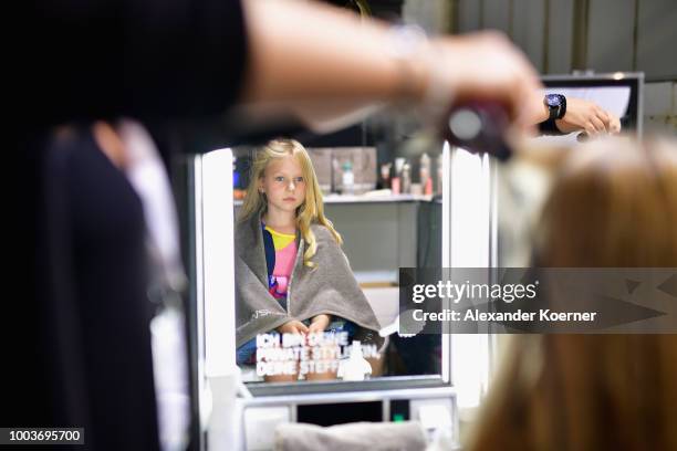 Child model is seen backstage ahead the Kids Fashion show during Platform Fashion July 2018 at Areal Boehler on July 22, 2018 in Duesseldorf, Germany.