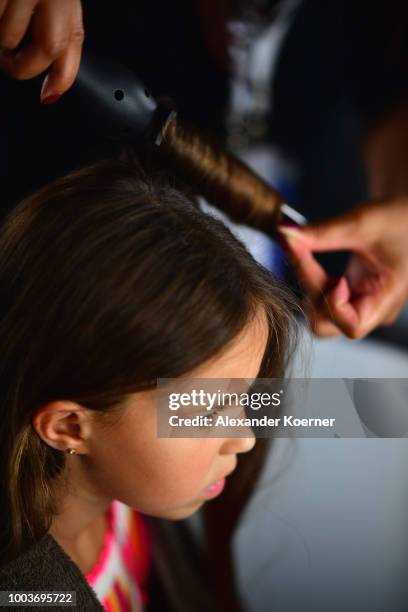 Child model is seen backstage ahead the Kids Fashion show during Platform Fashion July 2018 at Areal Boehler on July 22, 2018 in Duesseldorf, Germany.