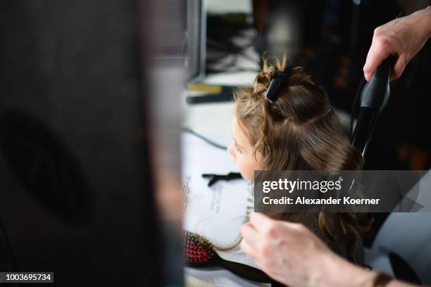 Child model is seen backstage ahead the Kids Fashion show during Platform Fashion July 2018 at Areal Boehler on July 22, 2018 in Duesseldorf, Germany.