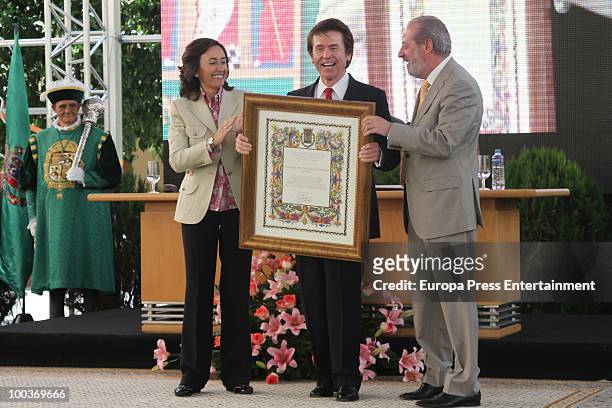 Rosa Aguilar, Raphael and Fernando Villalobos attend the Seville Golden Medal Ceremony at Seville Province Day on May 23, 2010 in Seville, Spain.