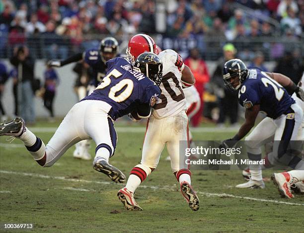 Linebacker Brad Jackson of the Baltimore Ravens was putting a flying tackle on Running Back Jamel White of the Cleveland Browns at PSINet Ravens...