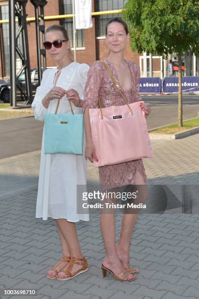 Iris Kuechler and Simone Kuechler attend the 3D Fashion Show by Lexus show during Platform Fashion July 2018 at Areal Boehler on July 21, 2018 in...