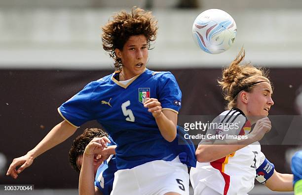 Valeria Kleiner of Germany heads for the ball with Roberta Filippozzi of Italy during the UEFA Women's Under-19 European Championship group A match...