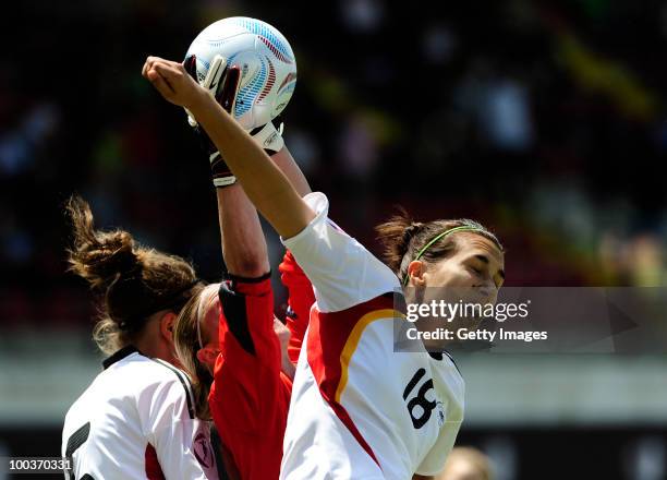 Kyra Malinowski of Germany fights for the ball with Katia Schroffenegger of Italy during the UEFA Women's Under-19 European Championship group A...