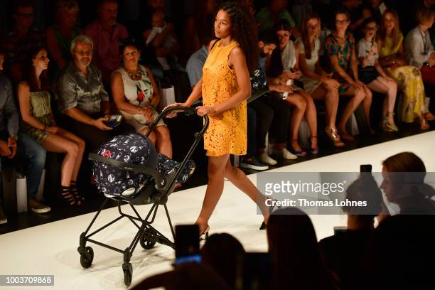 Model walks the Kids Fashion show during Platform Fashion July 2018 at Areal Boehler on July 22, 2018 in Duesseldorf, Germany.