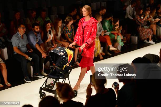 Model walks the Kids Fashion show during Platform Fashion July 2018 at Areal Boehler on July 22, 2018 in Duesseldorf, Germany.