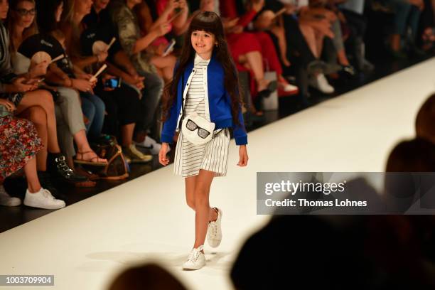 Model walks the Kids Fashion show during Platform Fashion July 2018 at Areal Boehler on July 22, 2018 in Duesseldorf, Germany.