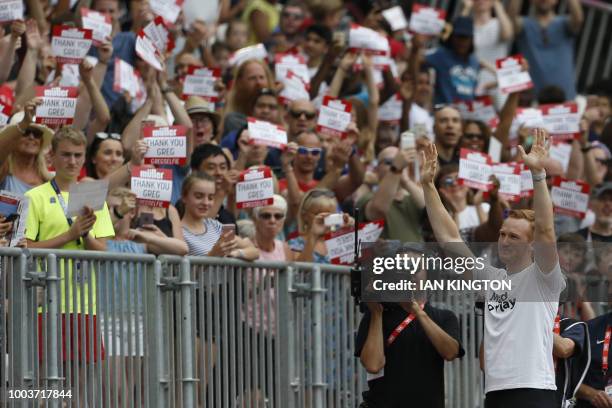 Britain's Greg Rutherford waves to the crowd after competing in the Men's long jump event during the IAAF Diamond League Anniversary Games athletics...