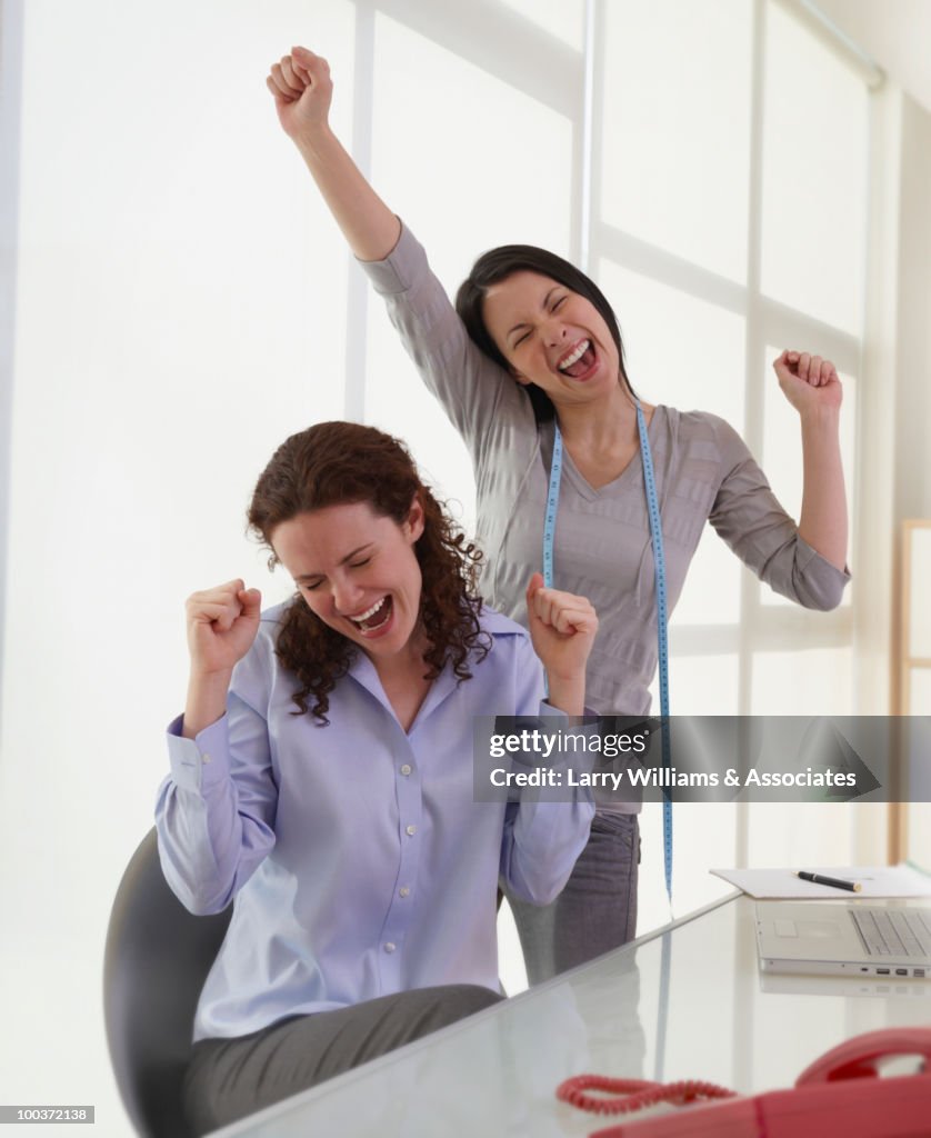 Work Cheering Businesswomen Cheering In Office High-Res Stock Photo - Getty Images