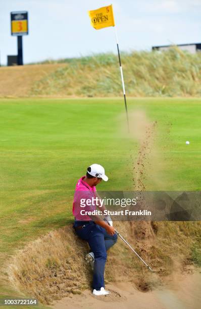Xander Schauffele of the United States plays a shot from a bunker on the fifth hole during the final round of the 147th Open Championship at...