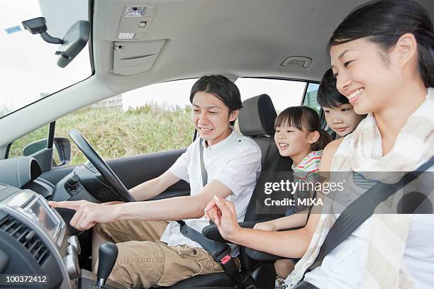family going for a drive - automotive-navigation-system stock pictures, royalty-free photos & images