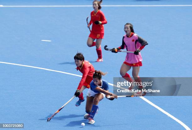 Giuliana Ruggieri of Italy shoots and scores her side's third goal as Jiangxin He of China attempts to block, during the Pool A game between China...