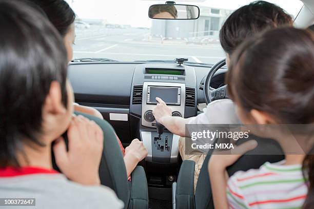 family going for a drive - automotive-navigation-system stock pictures, royalty-free photos & images